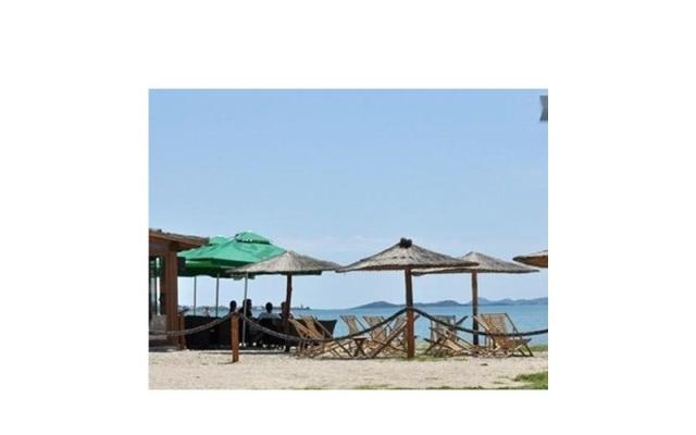 Kuća na plaži Lola Beach House Lola – Accommodation Sukosan Kroatië